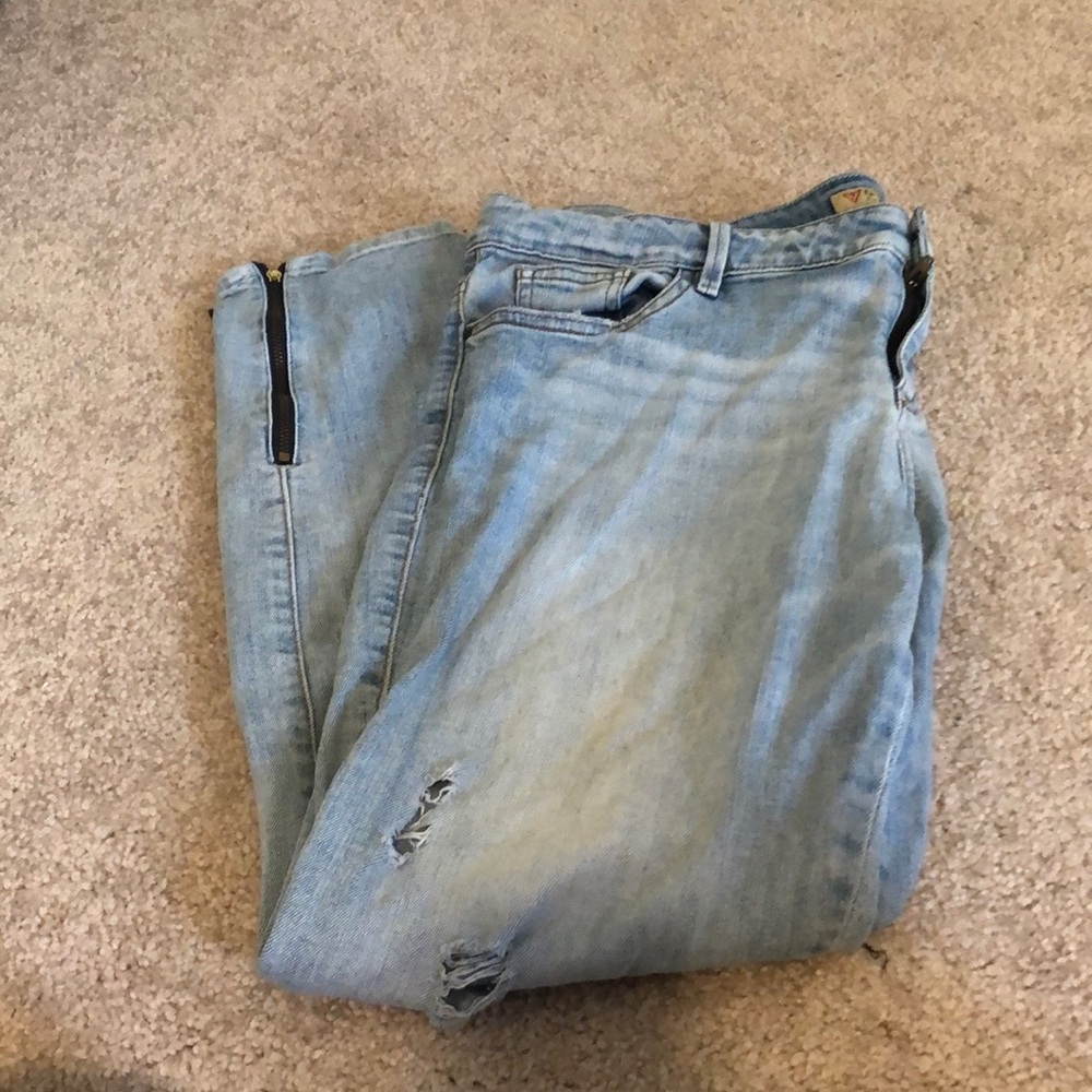 Guess light wash jeans with zipped side